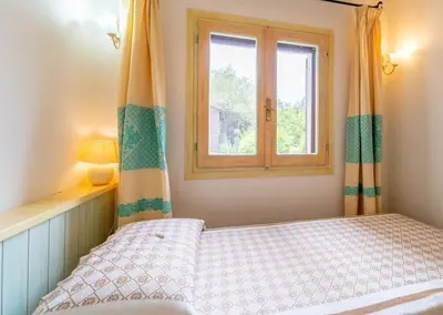 Letto o letti in una camera di Villa Zagara