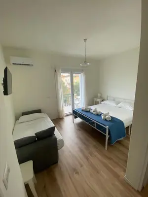 Letto o letti in una camera di Luscofusco