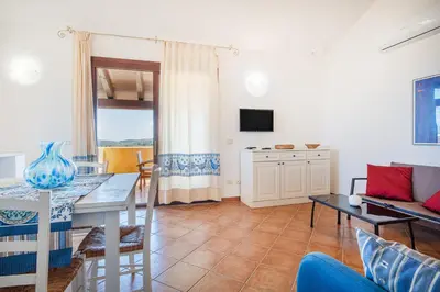 TV o dispositivi per l'intrattenimento presso AMBRA Holiday Rooms - Porto San Paolo