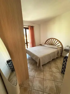 Letto o letti in una camera di Il Girasole casa vacanze