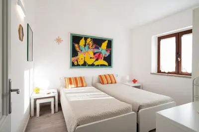 Letto o letti in una camera di Casa Cindy