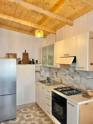Cucina o angolo cottura di Casetta Bianca con Giardino