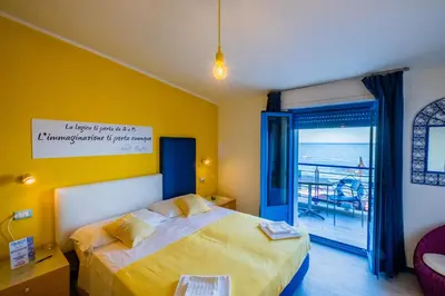Letto o letti in una camera di La Favorita Hotel