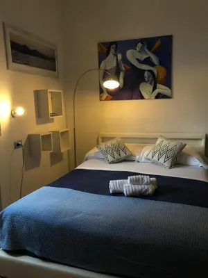Letto o letti in una camera di La Favorita Hotel