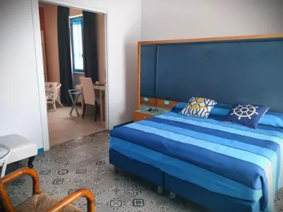 Letto o letti in una camera di La Favorita Hotel