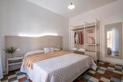 Letto o letti in una camera di Casa Elicriso