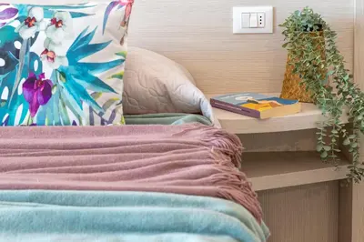 Letto o letti in una camera di Casa Agave