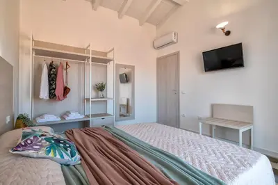 Letto o letti in una camera di Casa Agave