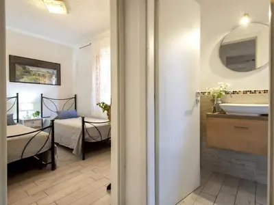 Letto o letti in una camera di Apartment D4 - I1- Baia de Bahas by Interhome
