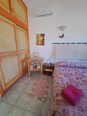 Letto o letti in una camera di Lu Lisandru