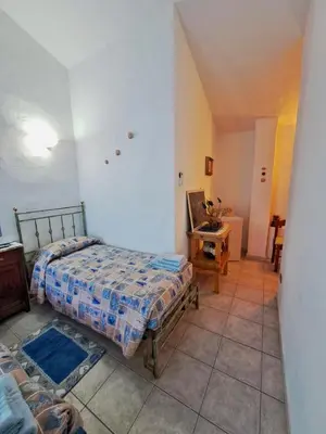 Letto o letti in una camera di Lu Lisandru