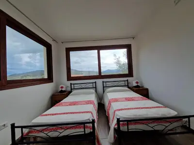 Letto o letti in una camera di Domo de mare