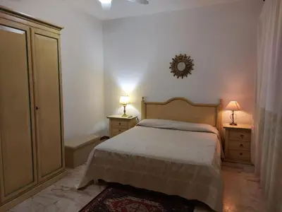Letto o letti in una camera di CASA Frau