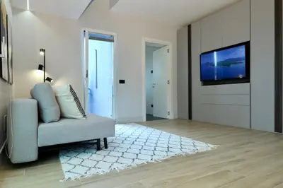 TV o dispositivi per l'intrattenimento presso Luxurious Garibaldi Penthouse - Big Terrace - Great view - Renovated - Historical Centre