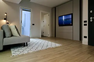 TV o dispositivi per l'intrattenimento presso Luxurious Garibaldi Penthouse - Big Terrace - Great view - Renovated - Historical Centre