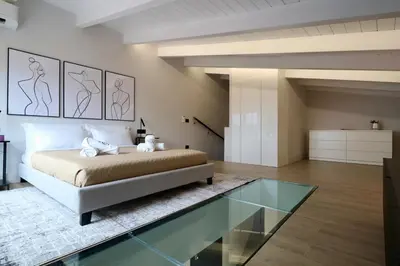 Letto o letti in una camera di Luxurious Garibaldi Penthouse - Big Terrace - Great view - Renovated - Historical Centre