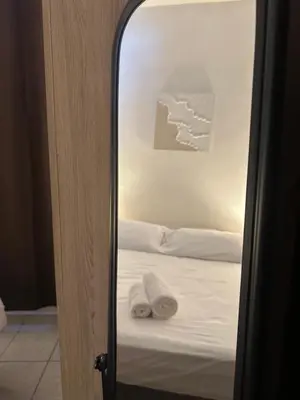 Letto o letti in una camera di Veranda Privata e BBQ -Comfort Moderno per 4 La Caletta