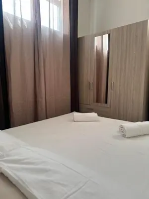 Letto o letti in una camera di Veranda Privata e BBQ -Comfort Moderno per 4 La Caletta
