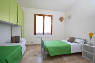 Letto o letti in una camera di Casa del Gelsomino by Wonderful Italy