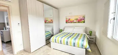 Letto o letti in una camera di Serendipity, La Caletta