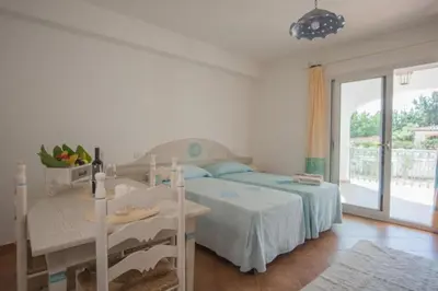 Letto o letti in una camera di Superb Le Residenze del Golfo di Orosei 1 Bedroom apartment for 4 people