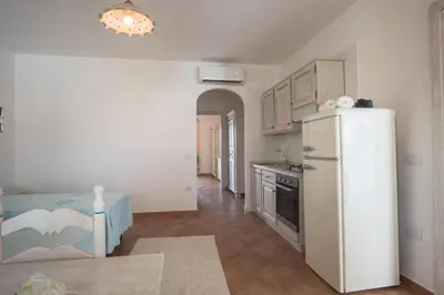 Cucina o angolo cottura di Superb Le Residenze del Golfo di Orosei 1 Bedroom apartment for 4 people