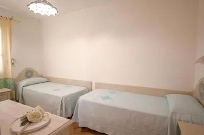 Letto o letti in una camera di Superb Le Residenze del Golfo di Orosei 1 Bedroom apartment for 4 people