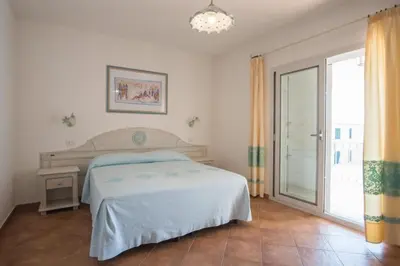 Letto o letti in una camera di Superb Le Residenze del Golfo di Orosei 1 Bedroom apartment for 4 people