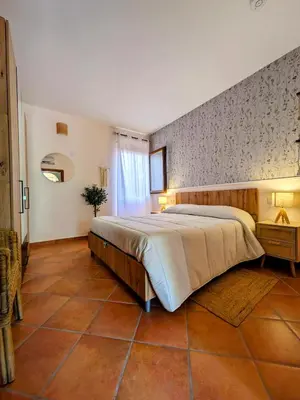 Letto o letti in una camera di Olivastro Apartment Murta Maria