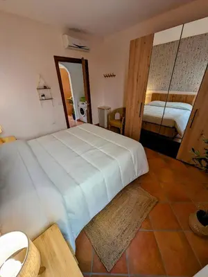 Letto o letti in una camera di Olivastro Apartment Murta Maria