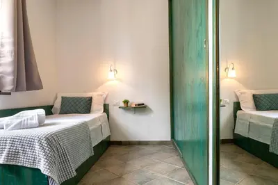 Letto o letti in una camera di La Terrazza sul Mare