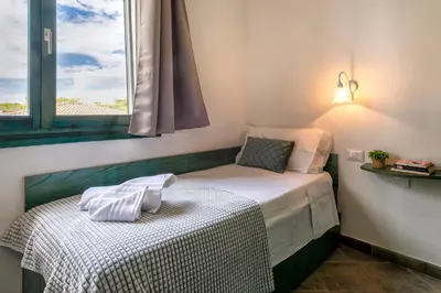 Letto o letti in una camera di La Terrazza sul Mare