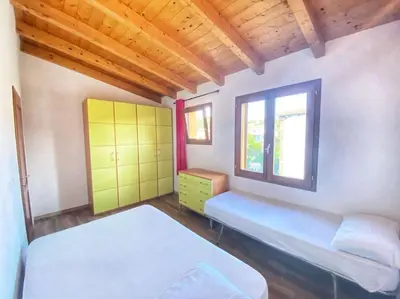 Letto o letti in una camera di Pettirosso 6