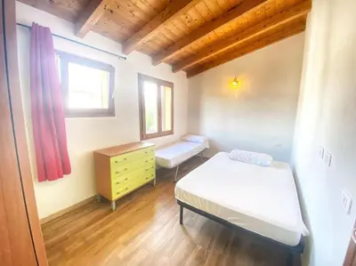 Letto o letti in una camera di Pettirosso 6