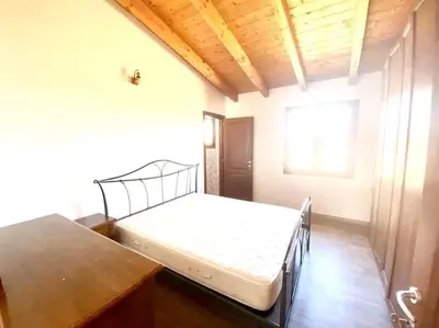 Letto o letti in una camera di Pettirosso 6