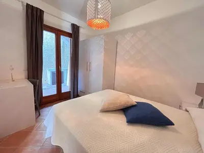 Letto o letti in una camera di Casa vacanze - Le Bacche di Maiorca