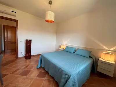 Letto o letti in una camera di Casa vacanze - Le Bacche di Maiorca
