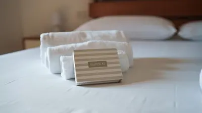 Letto o letti in una camera di Sunny House