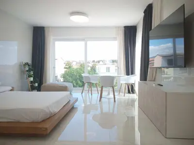 TV o dispositivi per l'intrattenimento presso Smart Luxury Suites & Apartments
