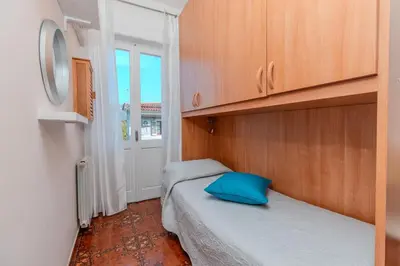 Letto o letti in una camera di Splendido Appartamento in centro a Padru