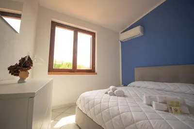 Letto o letti in una camera di Sa Capannizza