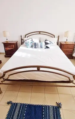 Letto o letti in una camera di Casa Verdi