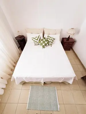 Letto o letti in una camera di Casa Verdi
