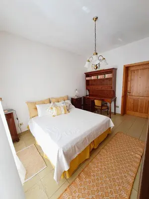 Letto o letti in una camera di Casa Verdi