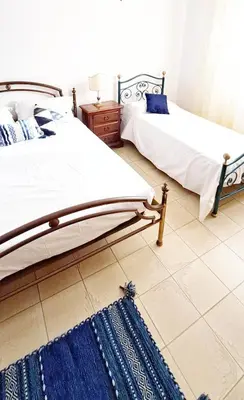 Letto o letti in una camera di Casa Verdi