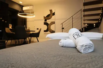 Letto o letti in una camera di Spacious Modern Fully equipped Apartment in Monumental Building - Parking - Historical Centre