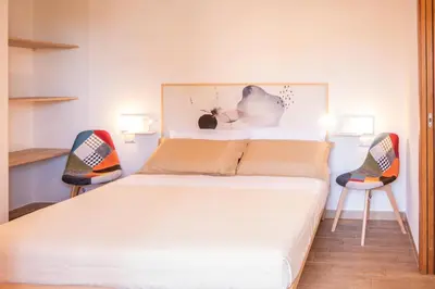 Letto o letti in una camera di Acquarello Rooms