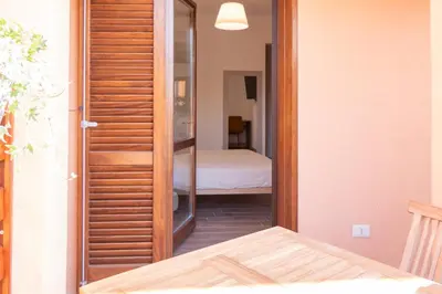 Letto o letti in una camera di Acquarello Rooms
