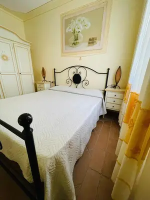 Letto o letti in una camera di Appartamento le querce