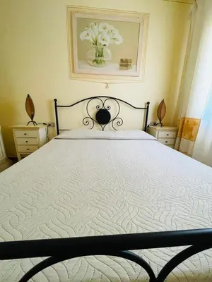Letto o letti in una camera di Appartamento le querce